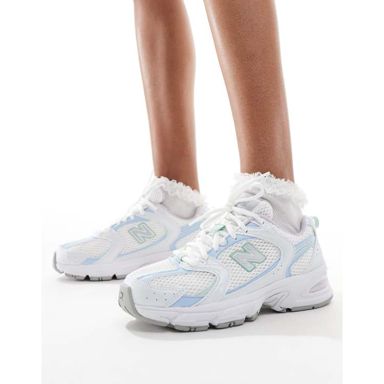 New Balance 530 trainers in white and light blue ASOS