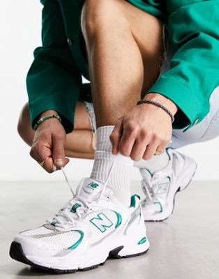 New Balance 530 trainers in white and metallic with blue detailing - ASOS Price Checker