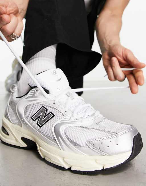 New balance outlet silver trainers