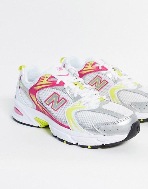 New Balance 530 trainers in white and pink