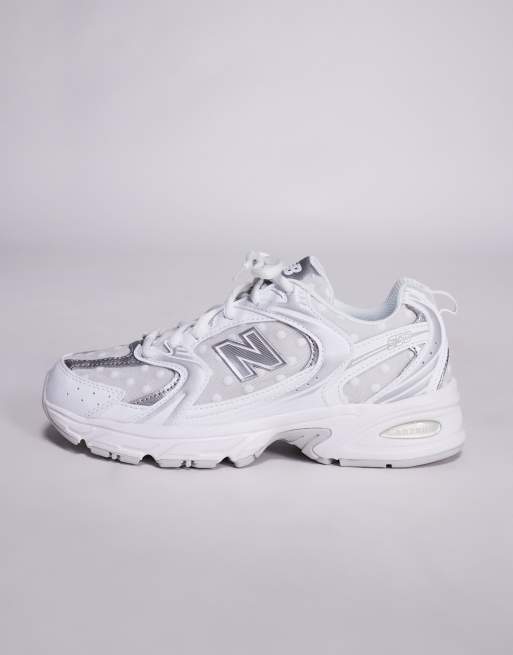 New Balance 530 trainers in white and silver polka dot | ASOS