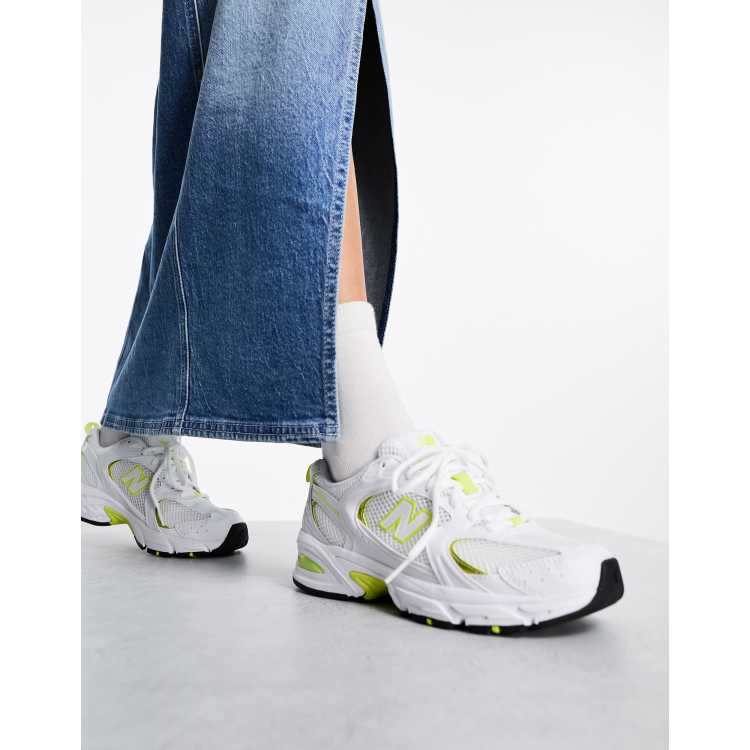 New Balance 530 trainers in white and yellow ASOS