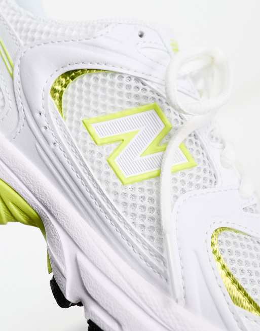 New Balance 530 trainers in white and yellow ASOS