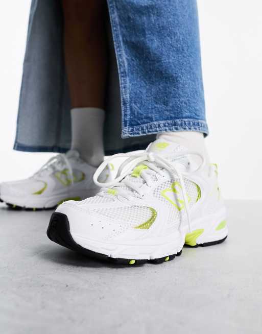 New Balance 530 trainers in white and yellow ASOS