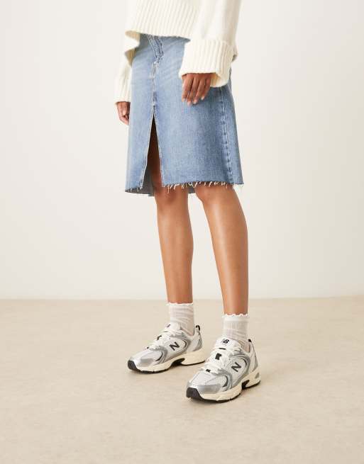 New Balance 530 trainers in white, black and silver, 3 of 5