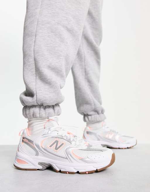 White and pink hot sale new balance shoes