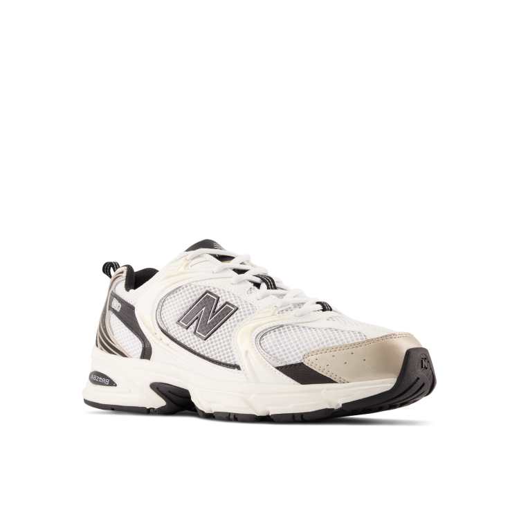 New Balance 530 trainers in white with black and gold detailing ASOS