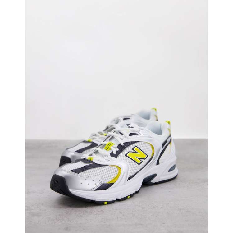 New Balance 530 trainers in white yellow and navy ASOS