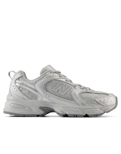 New Balance 530 trainers with polka dot detail in silver grey