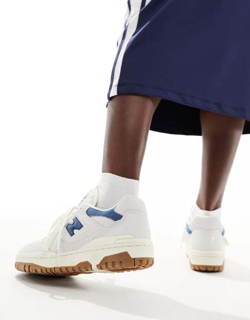 New Balance 550 gum sole sneakers in white with denim blue