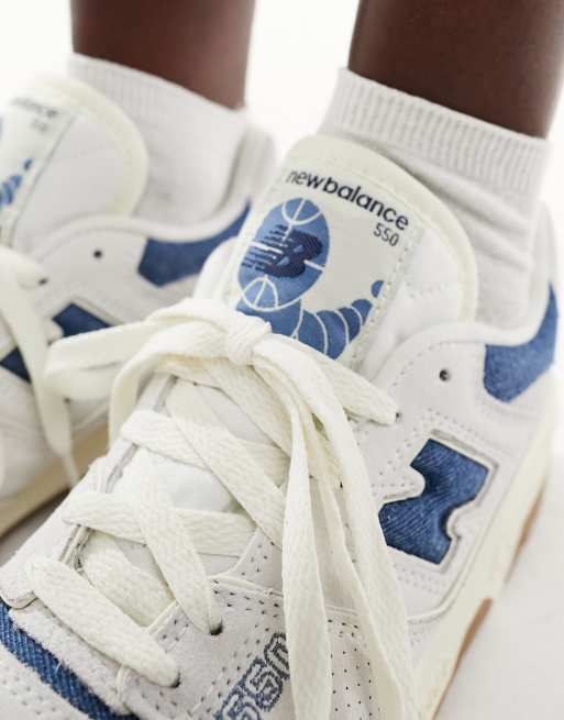 New Balance 550 gum sole sneakers in white with denim blue detail