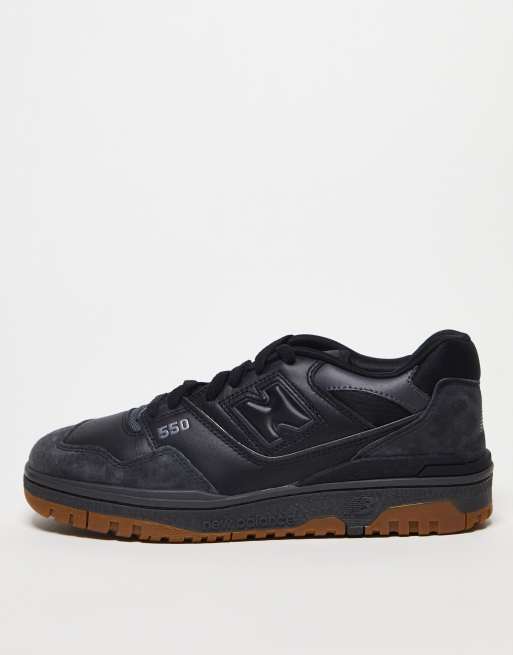 New Balance 550 sneakers in black with gum sole