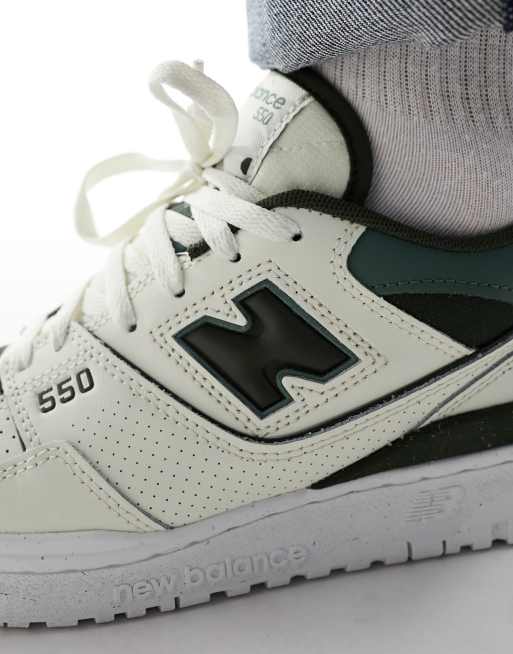 New Balance 550 sneakers in off-white and green