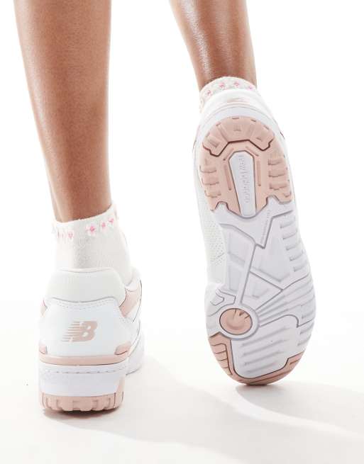 New Balance 550 sneakers in white and pink ASOS