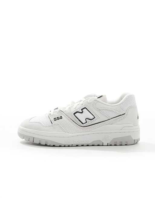 New Balance 574 sneakers in white with black detail