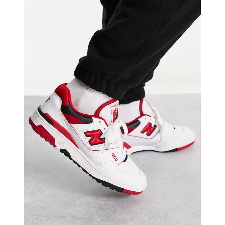 New Balance 550 sneakers in white with burgundy detail