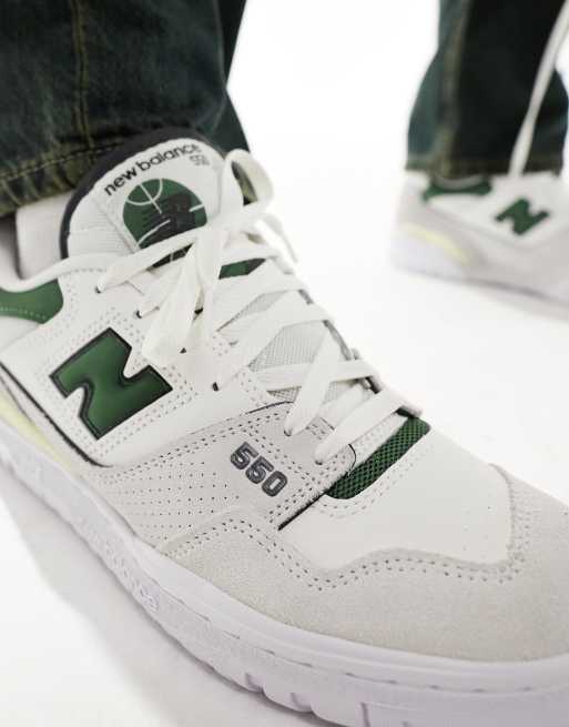 New Balance 550 sneakers in white with green detail