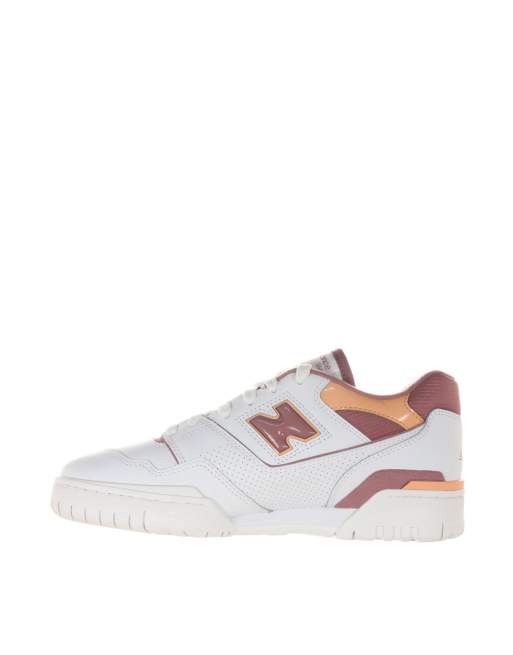 New Balance 550 sneakers in white and orange