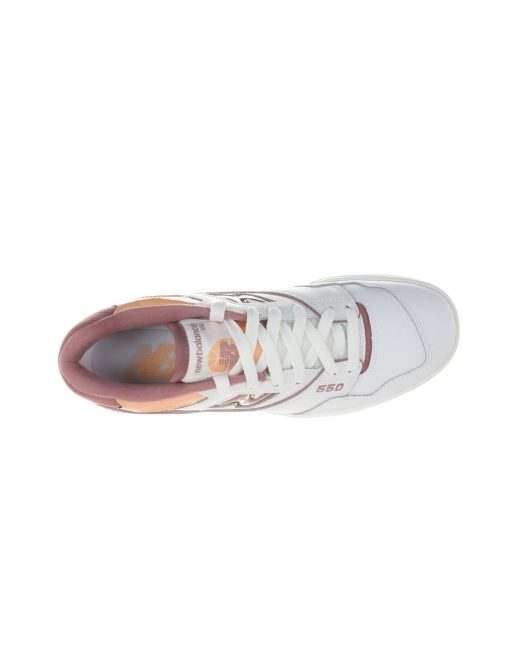 New Balance 550 sneakers with pink and orange detail in