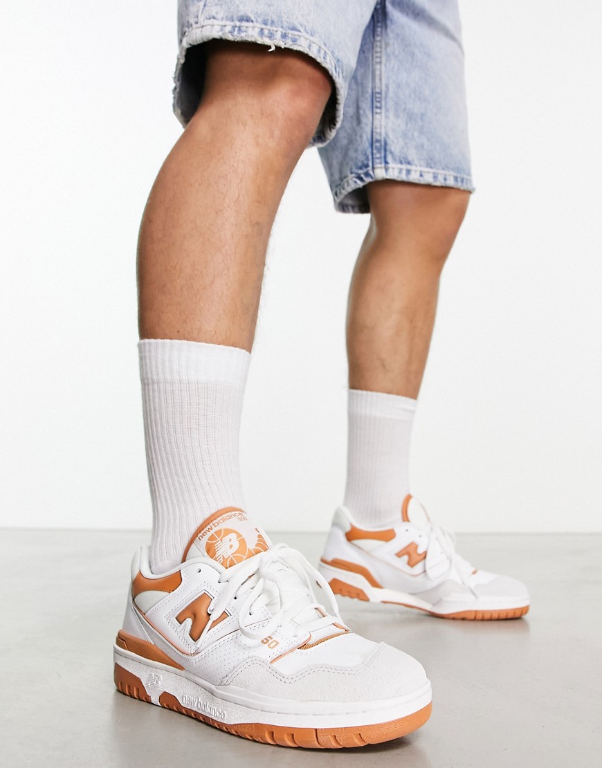 New Balance 550 trainers in white and orange
