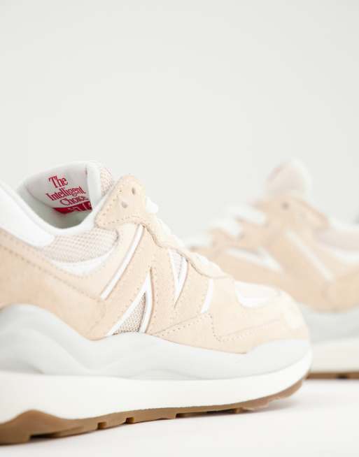 new balance 57 40 sneakers in pastel pink