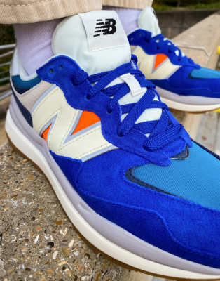 new balance blue suede trainers