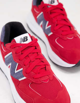 red nb trainers