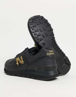 womens new balance black & gold 574 trainers