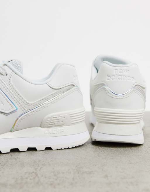 New Balance 574 trainers in metallic white and silver