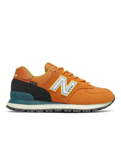 New Balance 574 Gore-Tex sneakers in orange and blue | ASOS