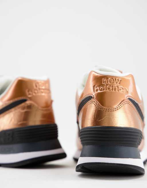 New Balance 574 metallic trainers in copper gold