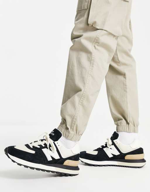 New Balance 574 premium trainers in black and cream ASOS