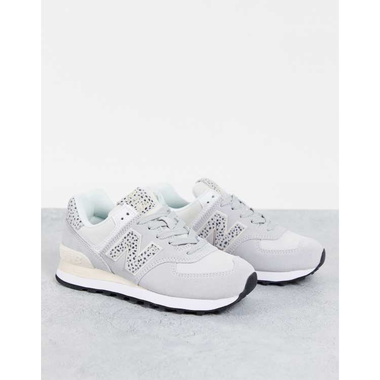 New Balance 574 Sneaker in WeiB mit Leopardenmuster exklusiv bei ASOS