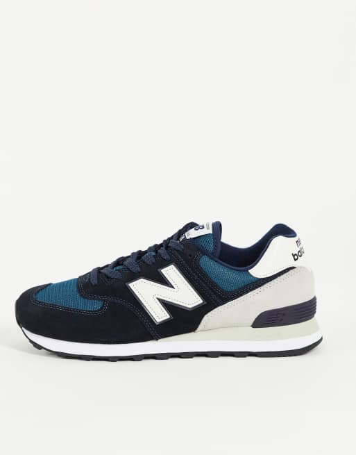 New Balance 574 sneakers in black and gray