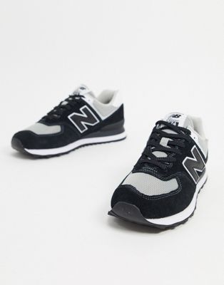New Balance 574 sneakers in black and 