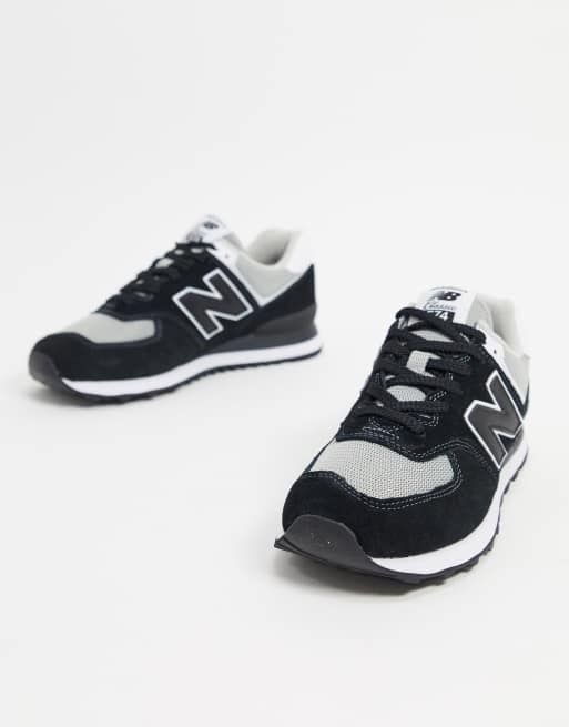New Balance 574 sneakers in black and gray ASOS