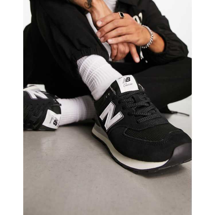 New Balance 574 sneakers in black with white detail