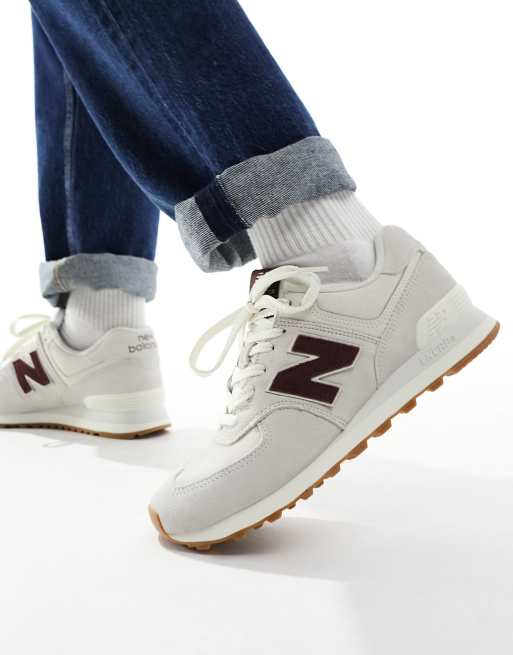 New Balance 574 sneakers in triple white with gum sole