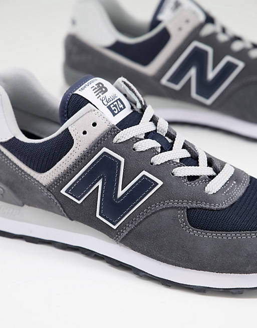 New Balance 574 sneakers in dark gray and navy ASOS