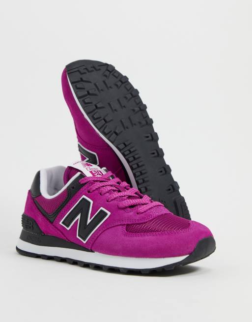 New Balance 574 sneakers in fuchsia and black