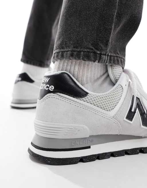 New Balance 574 sneakers in gray with black detail | ASOS