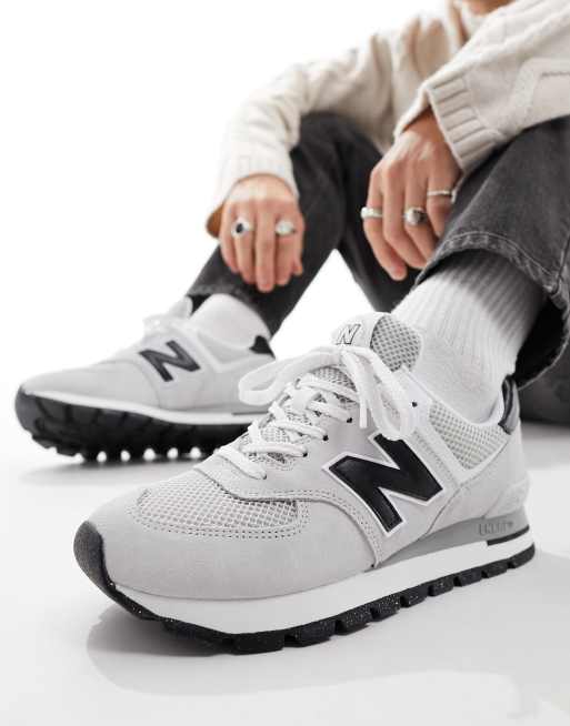 New Balance 574 sneakers in triple white with gum sole