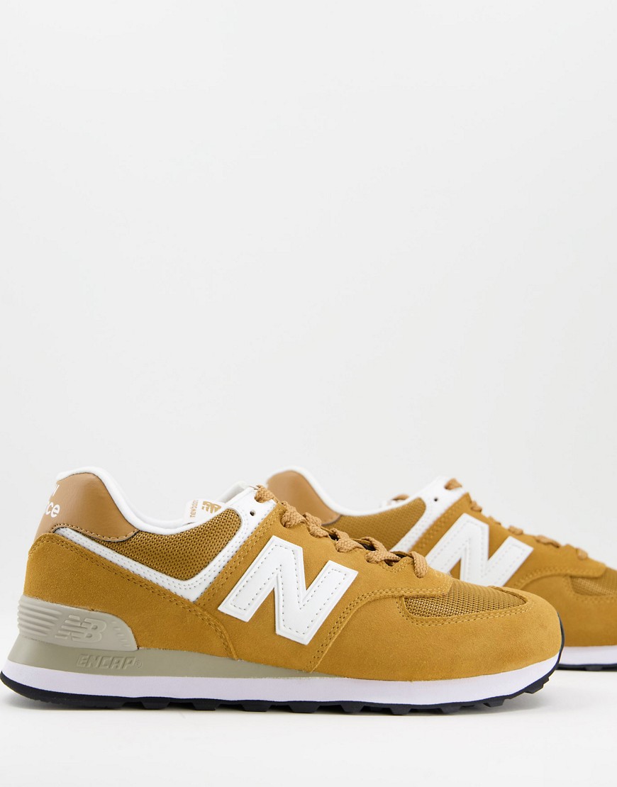 New Balance 574 sneakers in mustard yellow and white
