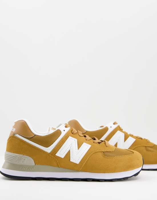https://images.asos-media.com/products/new-balance-574-sneakers-in-mustard-yellow-and-white/201809441-1-yellow?$n_550w$&wid=550&fit=constrain