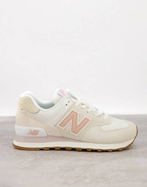 New Balance 574 sneakers in off white/pink