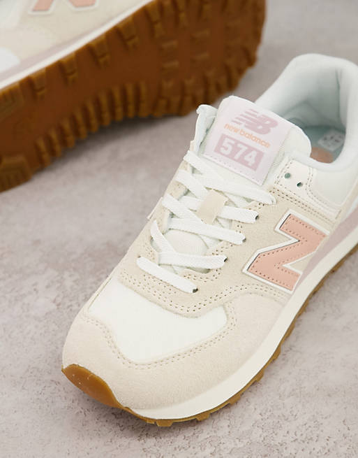 New Balance 574 sneakers in off white/pink