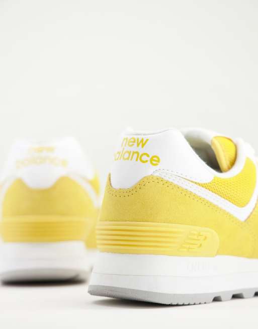 New Balance 574 sneakers in pastel yellow