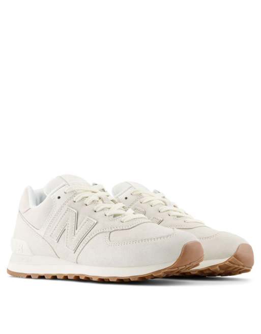 New Balance 574 sneakers in triple white with gum sole