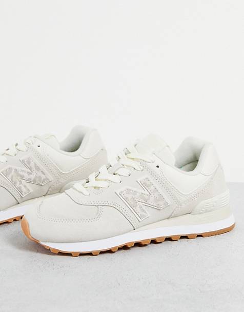 New Balance 574 sneakers in white and animal print