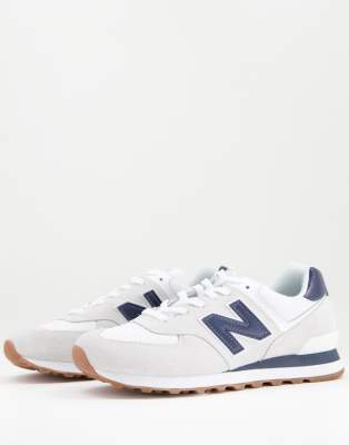 New Balance 574 sneakers in white and navy